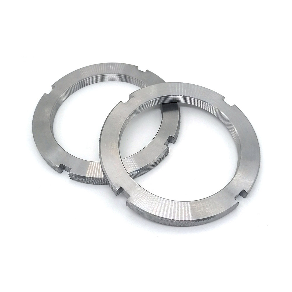 Visiškai įsriegtos apvalios veržlės