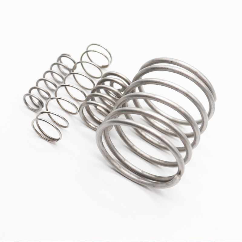 Sklandžiai išsivyniojanti spiralinė spyruoklė